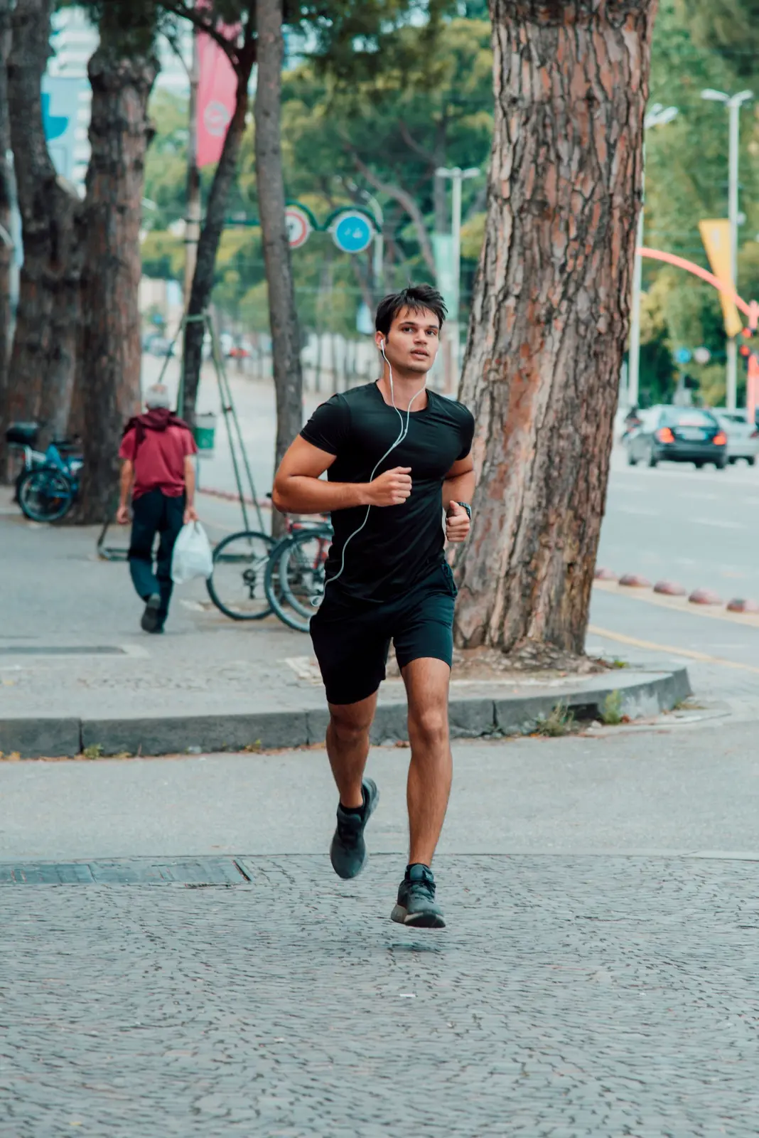 Man running outdoors, building discipline through consistent action